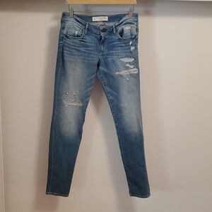 Abercrombie & Fitch distressed embroidered jeans. Faded blue. Size 10, 30W.